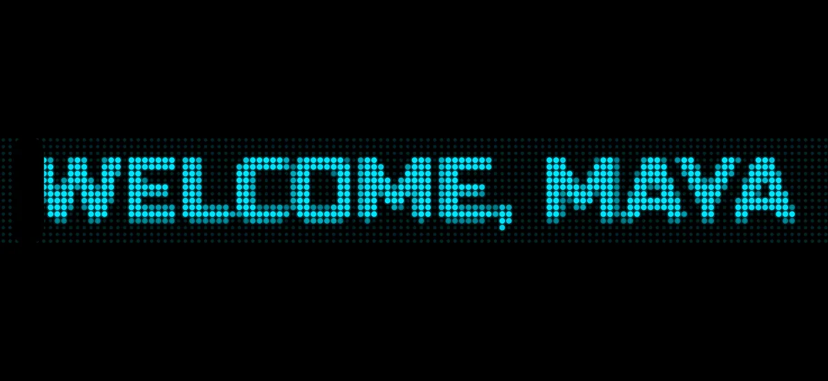 GlowText playing “WELCOME, MAYA” in cyan LED dot-matrix text across a landscape phone screen.